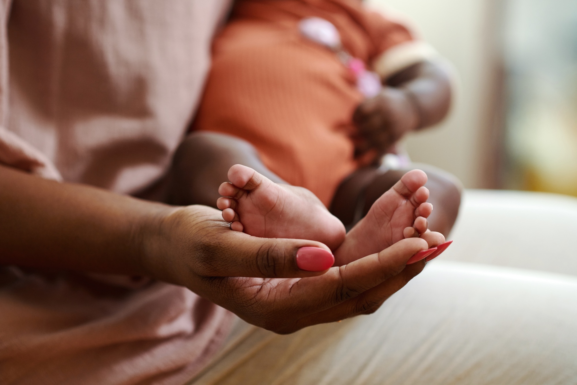 Little Feet of Newborn Baby